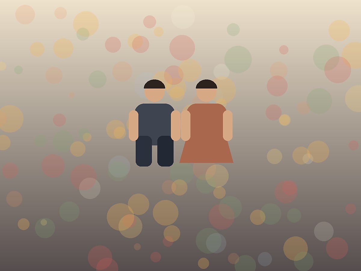 Festival Couple Portrait — Warm decorative lights, tasteful couple pose, festive but not template-like.